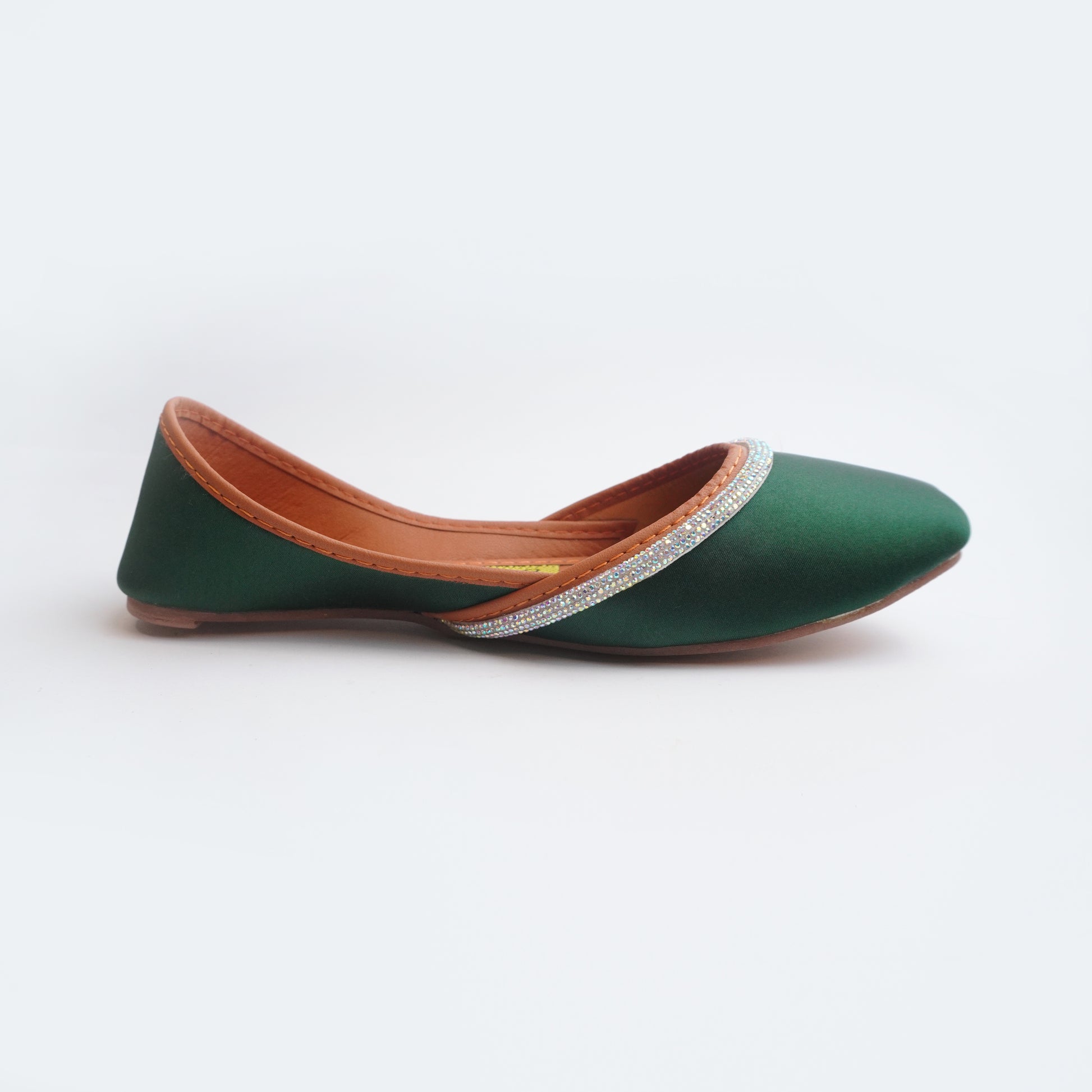 Women’s green designer flat shoes with shimmering strap detail – stylish ethnic and casual footwear