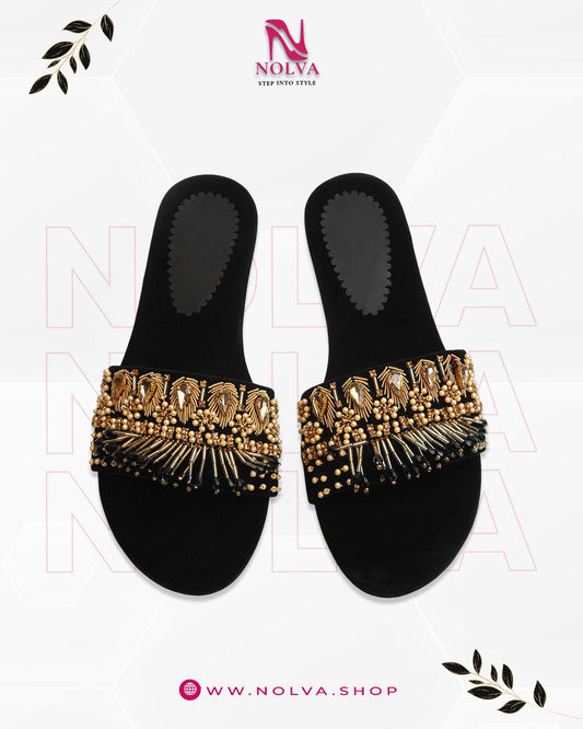 Nolva Velvet Shine black velvet sandals with golden and black bead embellishments – luxury flat footwear for women’s party and festive wear